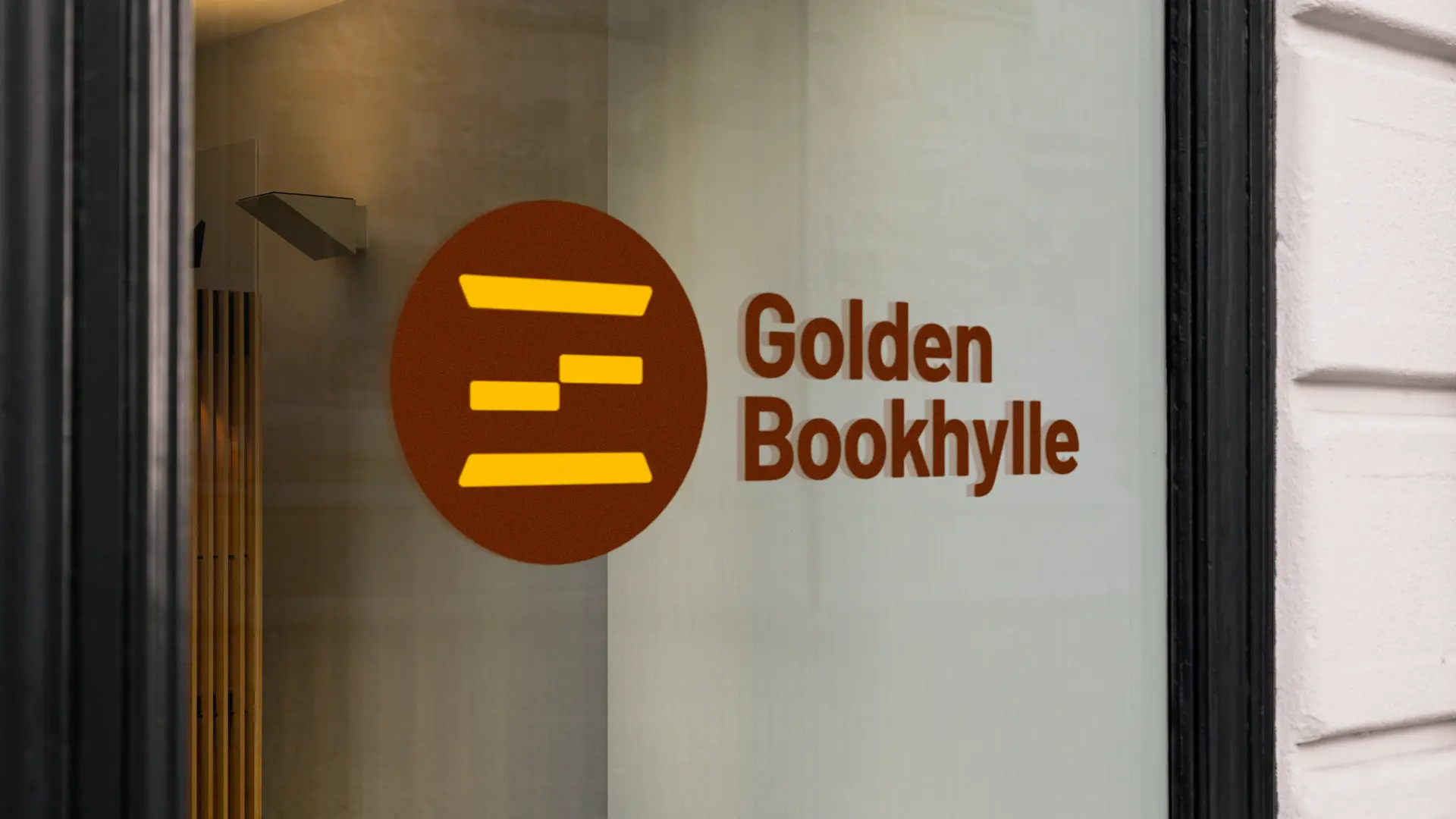 Golden Bookhylle Logo on Window